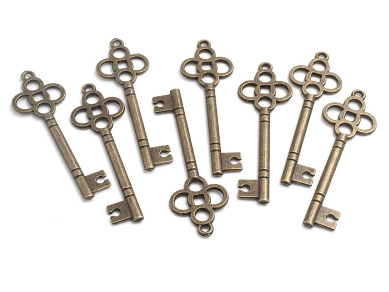verzierte Anhänger als Schlüssel in antik bronzefarben 8 Stück