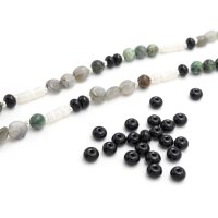 Perlen als Rondelle aus synthetischem Onyx in schwarz 6x4 mm 1 Strang ca. 95 Stück