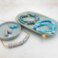 Lampwork-Perlen in Blautönen mit verschiedenen...