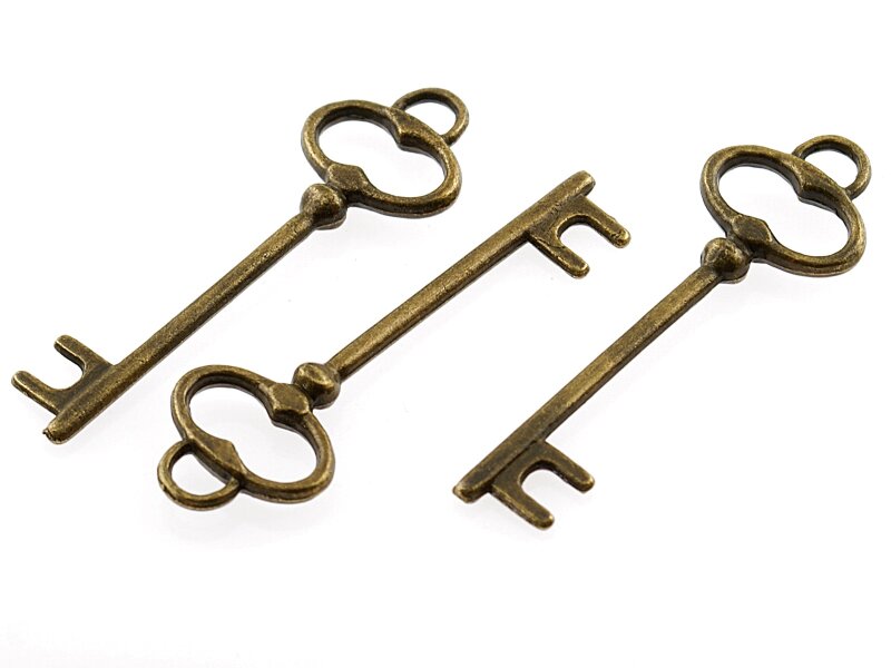 8 lange Schlüssel in vintage Bronze, 40 mm
