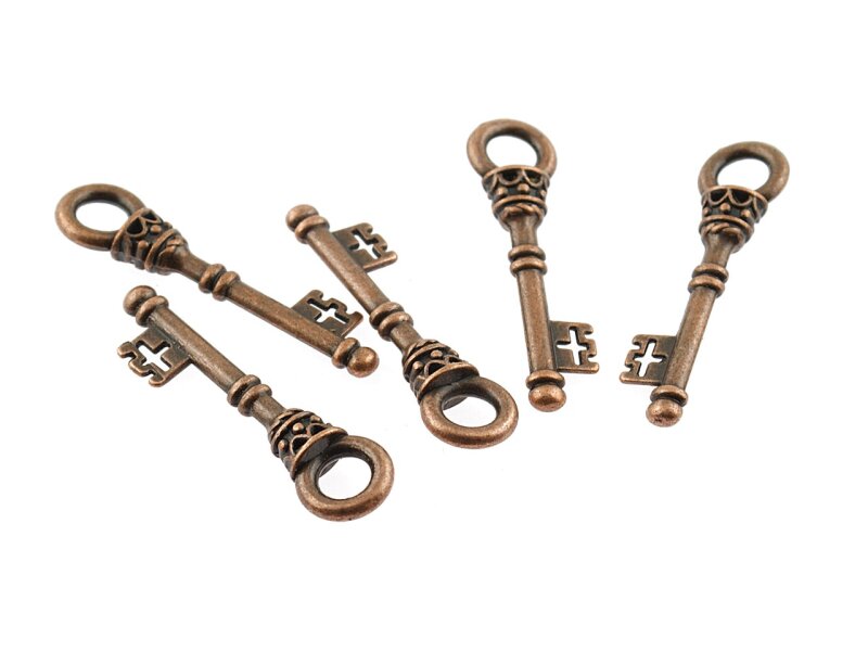 8 vintage Schlüssel in antik Kupfer