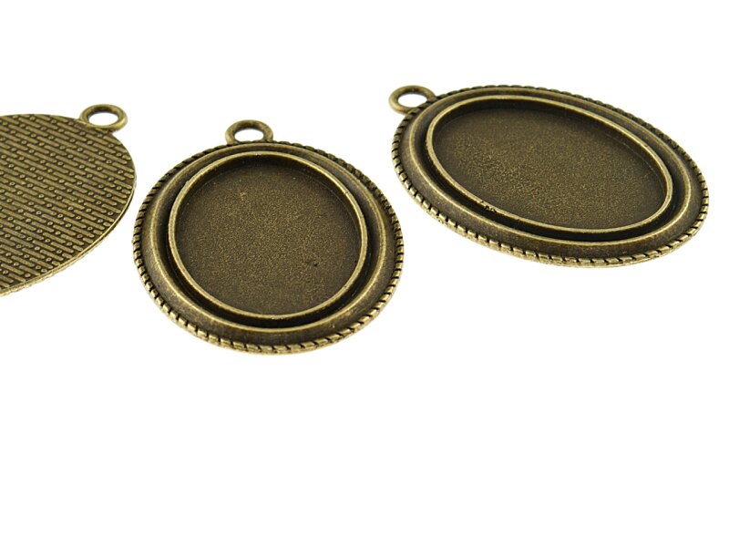 2 ovale Fassungen für 30 x 20 mm Cabochons in antik Bronze