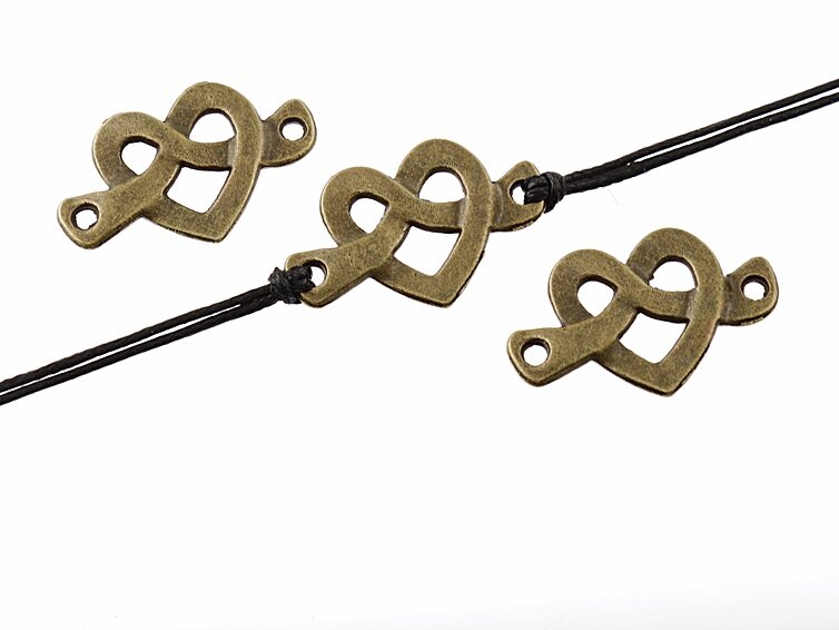 8 geschlungene Verbinder "Herz" in antik bronzefarben