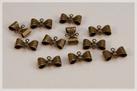10 filigrane Verbinder als Schleifchen in antik Bronze
