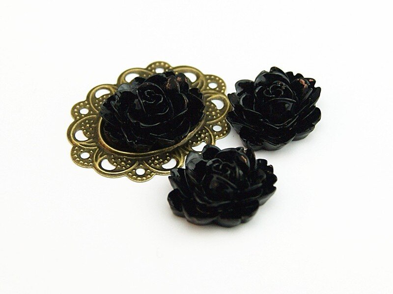 4 ovale Cabochons als Blume in schwarz, 18 x 13 mm