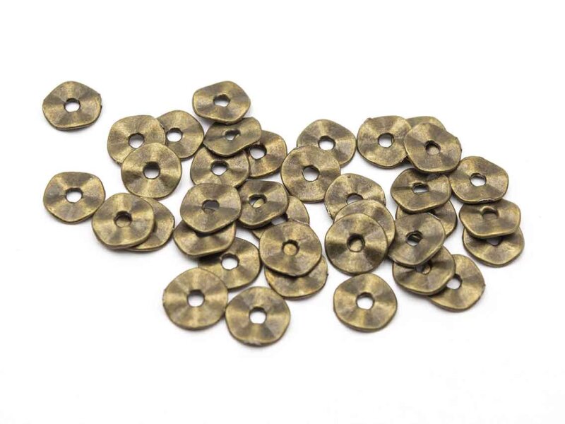 40 zarte gewellte Scheiben in antik Bronze, 7 mm